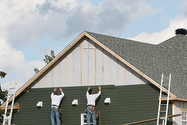 Professional Siding Contractor technician working in Linden, NC